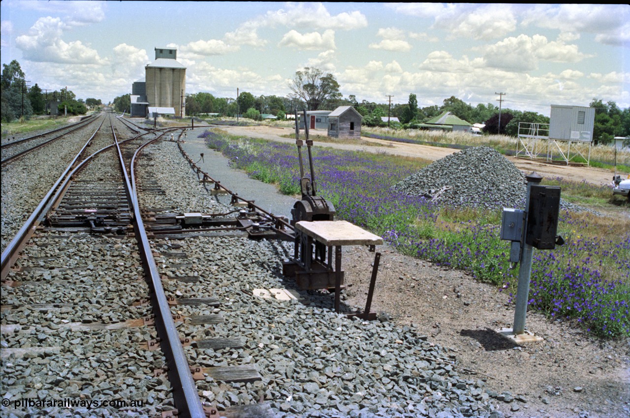 189-02
Uranquinty, located at the 535.72 km on the NSW Main South line, view looking south, view of the interlocking for ground frame B for the goods and grain sidings, the original and newer weighbridge buildings can be seen above the levers.
