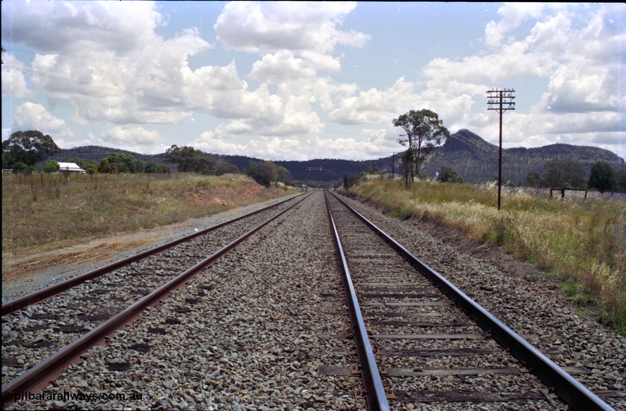 189-11
The Rock, located at the 550.29 km on NSW Main South line, view looking south along the Mainline with the Down Loop on the left.
