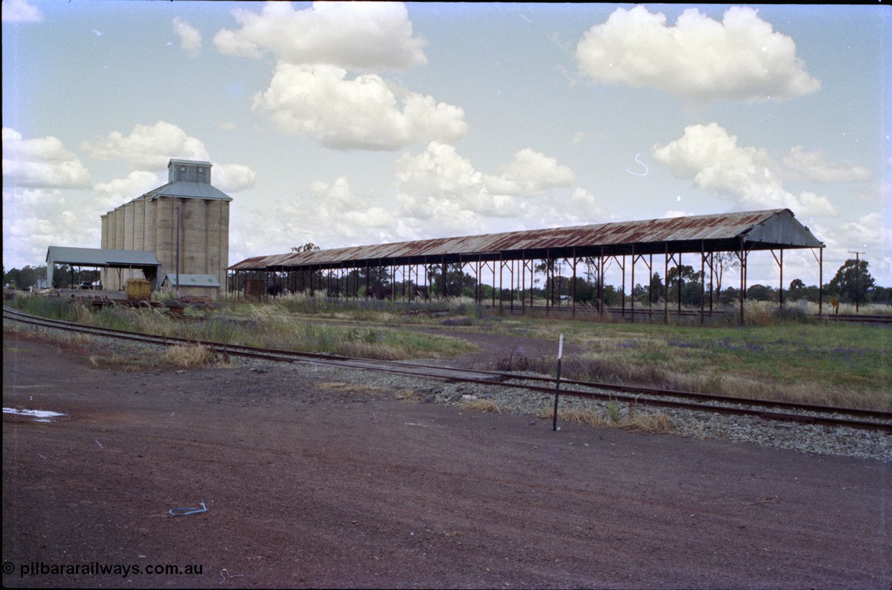 189-14
The Rock, located at the 550.29 km on NSW Main South line, view looking north with the Back Road with the silo complex and the 98 metre long bagged grain shed still standing.
