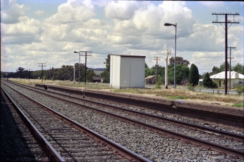 189-18
Yerong Creek, located at the 565.08 km on the NSW Main South line, view looking north at the remains of the station platform, one sign has been snapped in half.
