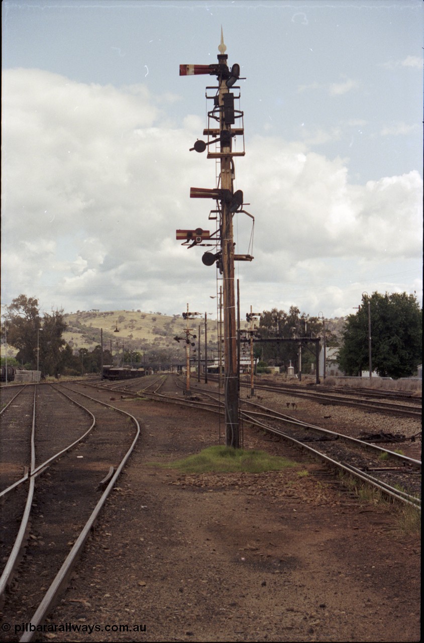 190-11
Cootamundra, NSW Main South, looking south, with the Sorting Sidings at left, and main yard in the middle, mainlines at right with the Down Refuge running down the middle of image.
