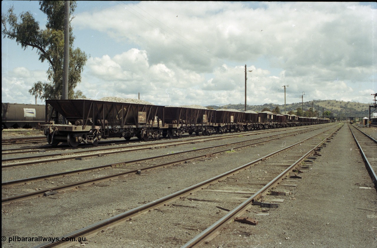 190-14
Cootamundra, NSW Main South, a loaded rake of ballast hoppers.
