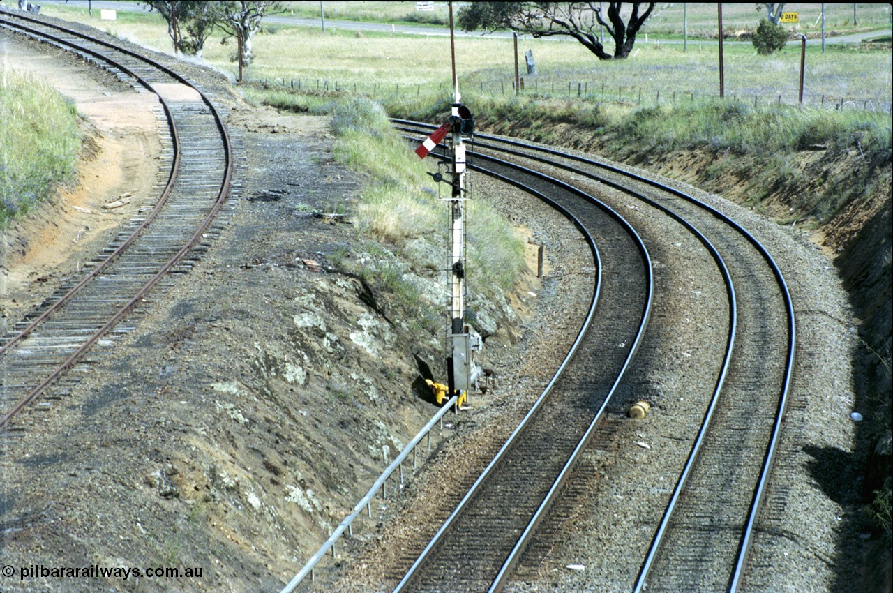 190-21
Demondrille, NSW Main South, a signal for Up trains running through to Goulburn, looking north from Wombat Road, the North Shunting Neck is on the left.
