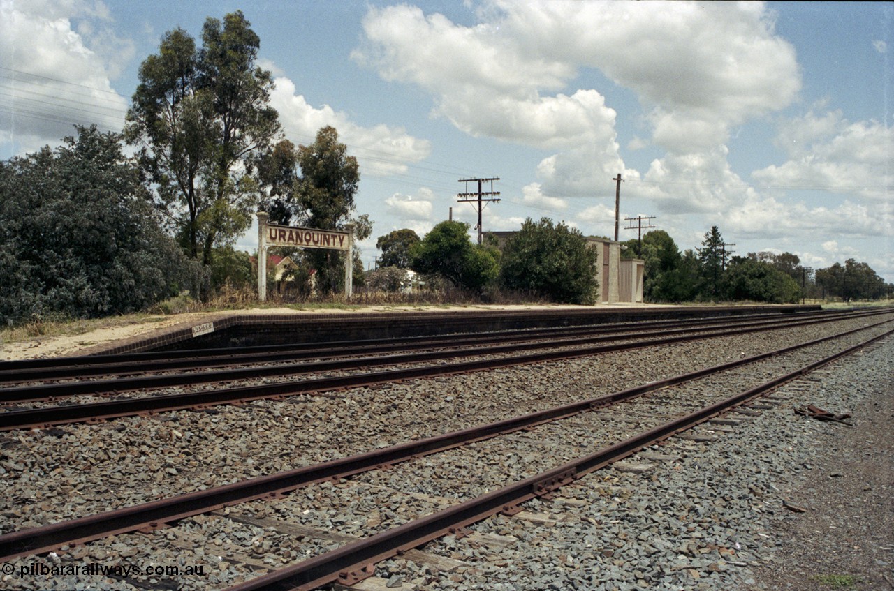 190-33
Uranquinty, located at the 535.72 km on the NSW Main South line, looking south at platform and remains of station.
