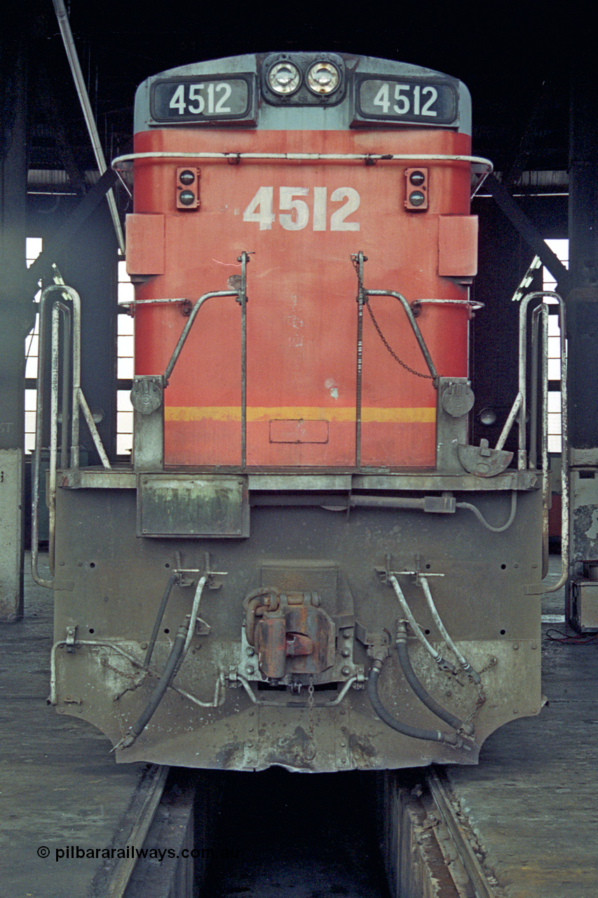 192-04
Junee, NSWSRA standard gauge locomotive depot, Junee Roundhouse, stored NSWGR 45 class unit 4512 an ALCo RSD-20 or DL-541 built by AE Goodwin in 1963 with serial 84154.
Keywords: 45-class;4512;AE-Goodwin;ALCo;RSD-20;DL-541;84154;