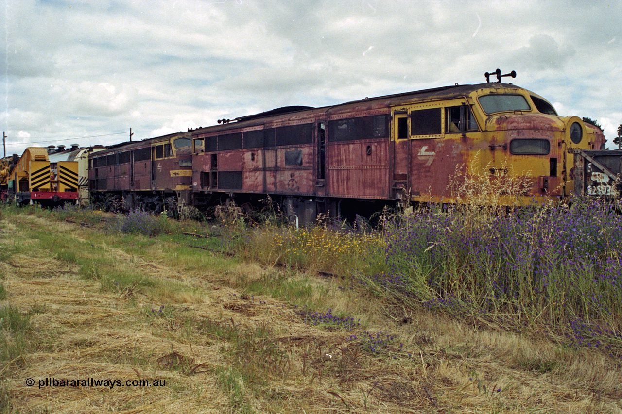 192-19
Junee, NSWSRA standard gauge locomotive depot, a pair of stored ALCo model DL-500B units in very poor condition.
Keywords: 44-class;AE-Goodwin;ALCo;DL-500B;