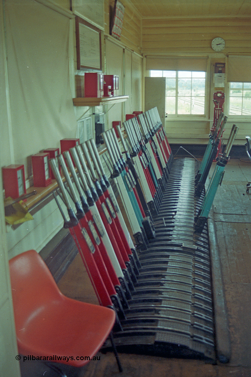 192-35
Cootamundra West, NSW, internal view of the 56 lever signal frame, staff instrument for the line west to Stockinbingal.
