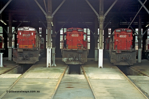 192-09
Junee, NSWSRA standard gauge locomotive depot roundhouse, a trio of ALCo RSD-20 or DL-541 models built by AE Goodwin for NSWGR as the 45 class are in the stages of being sealed up for long term storage, 4539 serial 84181 is already done, 4533 serial 84175 and 4537 serial 84179 wait their turn.
Keywords: 45-class;4539;AE-Goodwin;ALCo;RSD-20;DL-541;4533;4537;84181;84175;84179;