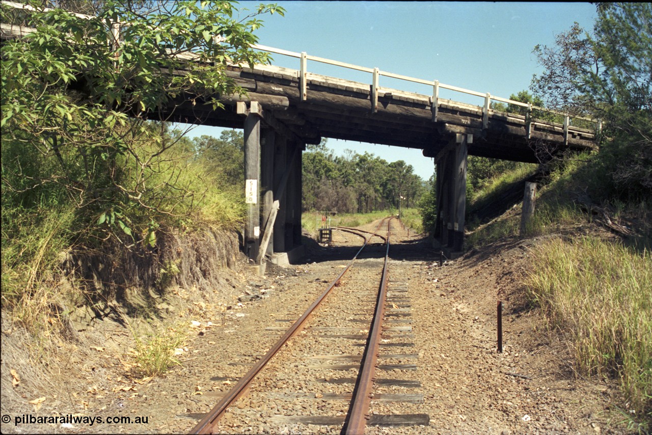 193-08
Moodlu quarry junction, looking west in the Down direction, quarry line curves away to the left, line continues around to the right to the site of Moodlu. The overbridge is marked as 5.150 km.
