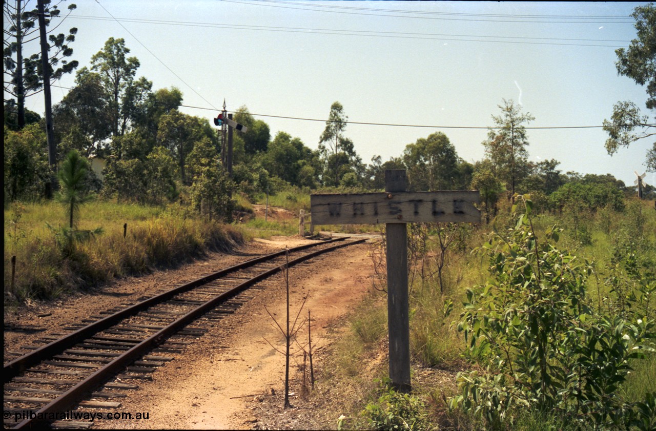 193-13
Moodlu, old grade crossing whistle sign, looking east in Up direction towards what is now Devantier Rd grade crossing. [url=https://goo.gl/maps/BTuoqeVnLtw]GeoData[/url].
