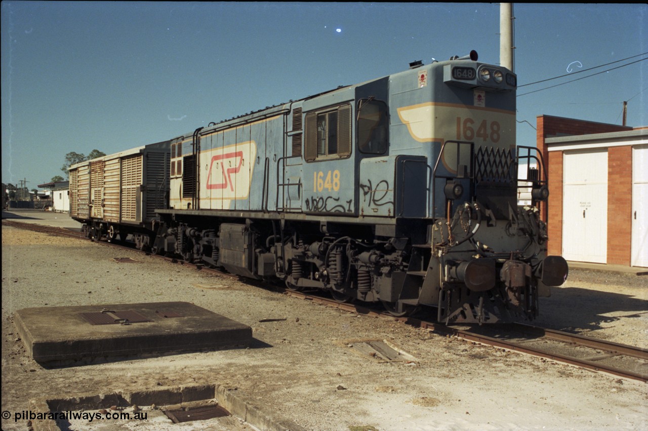 193-19
Gympie, station yard, QR narrow gauge unit 1648, an English Electric RS95C model built at their Rocklea Qld plant in 1967, known in the QR as class 1620. [url=https://goo.gl/maps/Yav8VtdvkZD2]GeoData[/url].
Keywords: 1620-class;1648;English-Electric;RS95C;A-190;