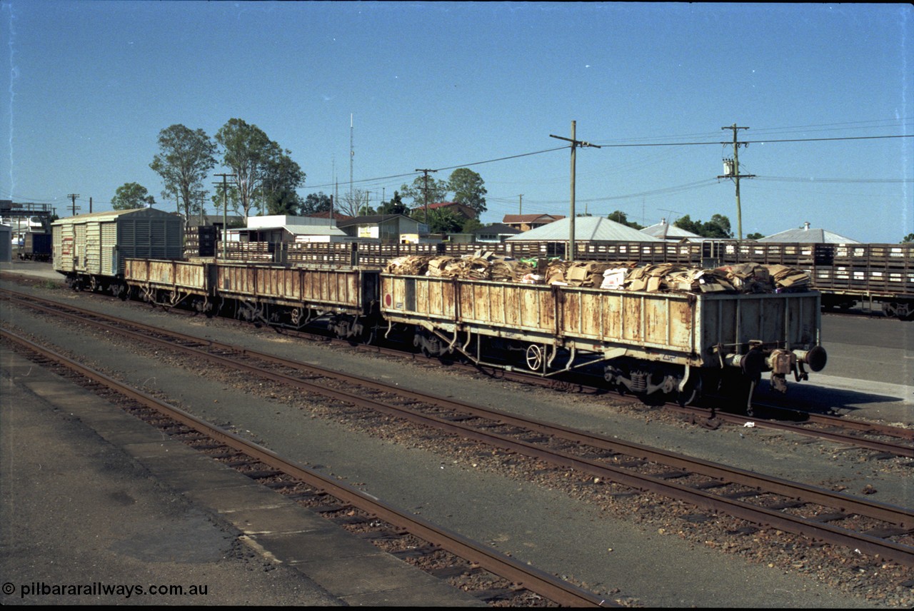 193-25
Gympie yard, possible HSAT type waggons, closet to camera has transition coupler fitted. Originally built as HSA types by Scotts and Comeng Qld.
