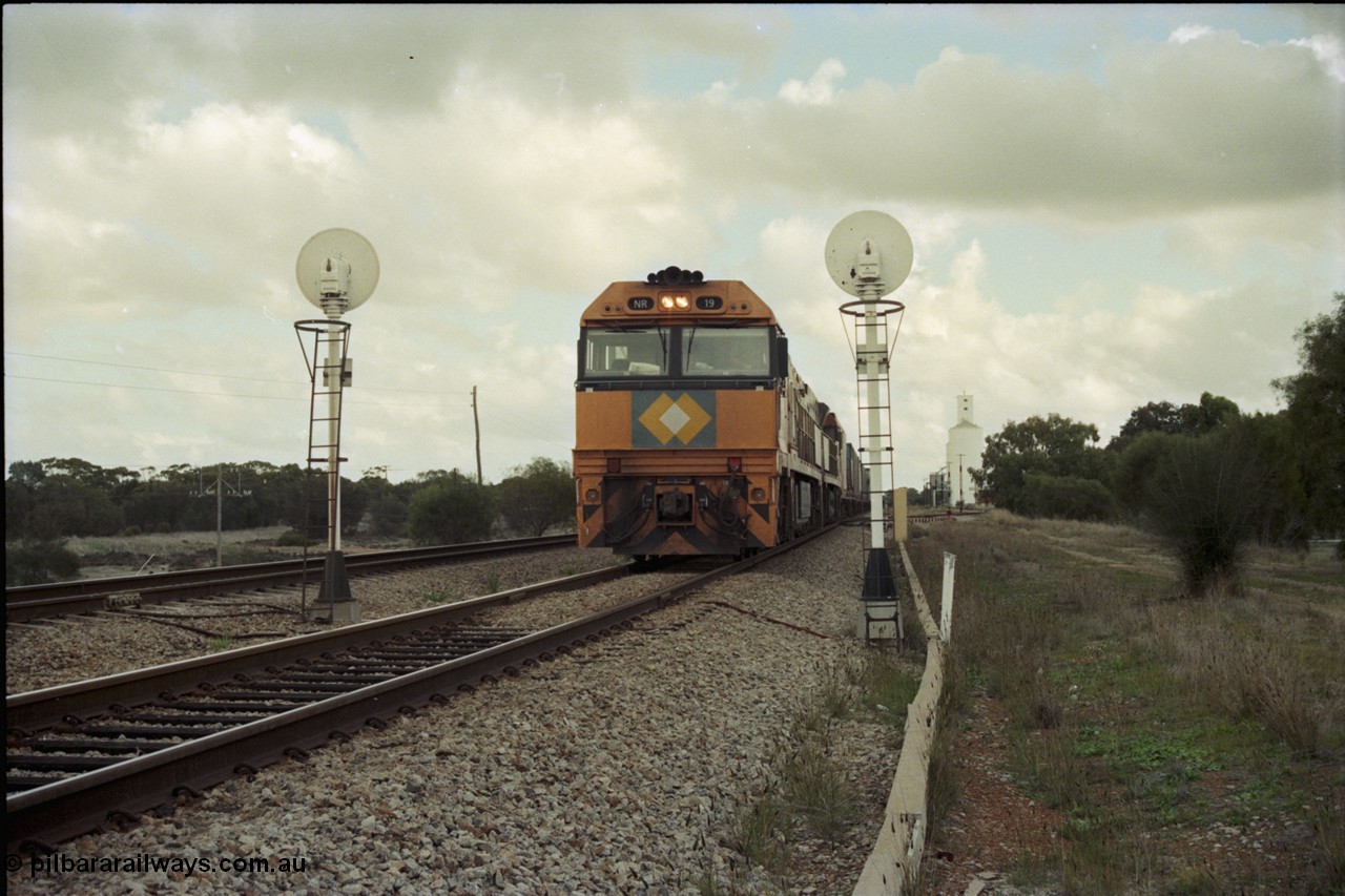 199-04
Meckering, National Rail NR class units NR 19 and NR 20 both being Goninan built GE Cv40-9i models head up train 7PM5 as they wait for a cross with the Prospector in the loop 1400 hrs 21st June 1997.
Keywords: NR-class;NR19;Goninan;GE;CV40-9i;7250-03/97-221;