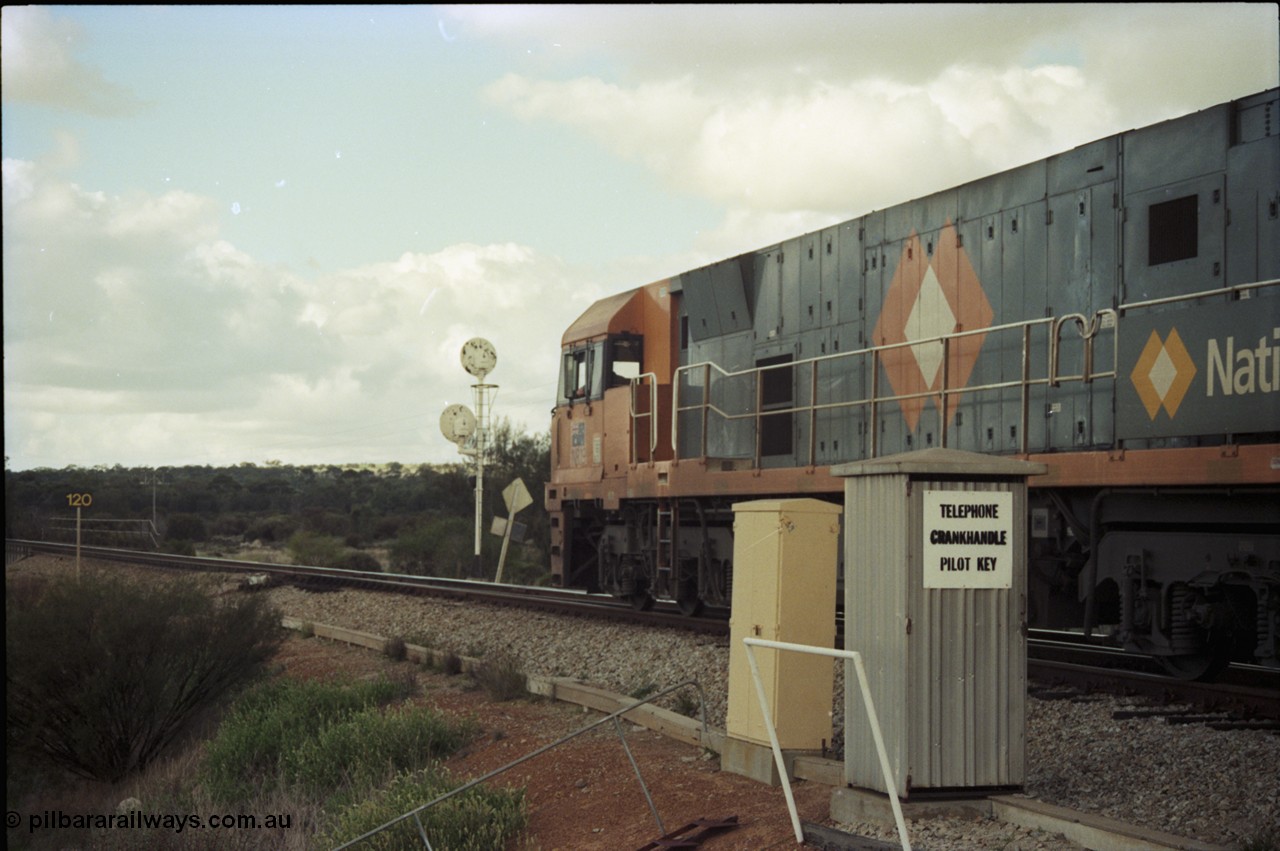 199-19
Meckering, National Rail NR class unit NR 19 Goninan built GE Cv40-9i model heads up train 7PM5 as it departs the loop 1400 hrs 21st June 1997.
Keywords: NR-class;NR19;Goninan;GE;CV40-9i;7250-03/97-221;