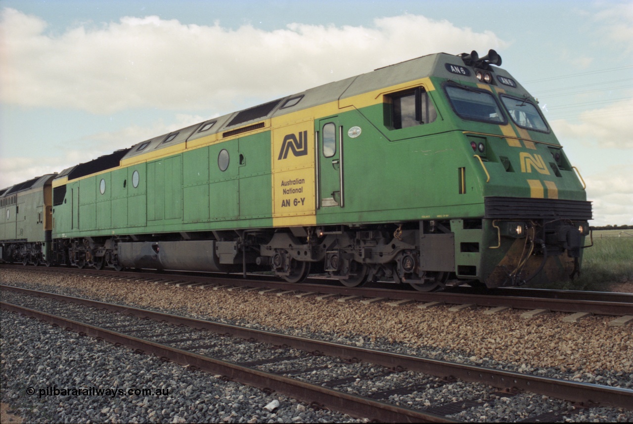 200-10
Moorine Rock, Australian National AN class AN 6 a Clyde Engineering built EMD model JT46C serial 93-1302, sits on the mainline with a Perth bound freight, 1500 hrs 22nd June 1997.
Keywords: AN-class;AN6;Clyde-Engineering-Somerton-Victoria;EMD;JT46C;93-1302;