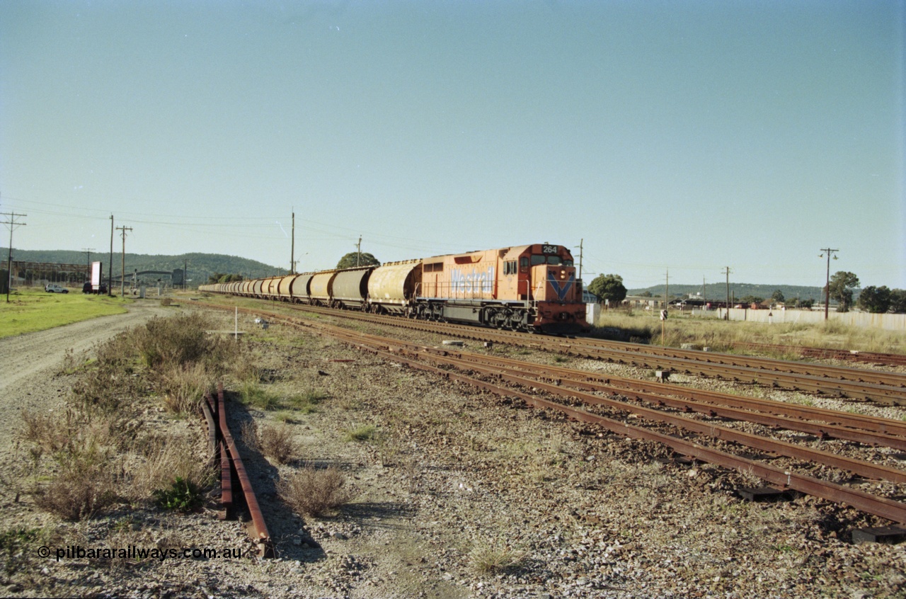 200-32
Midland, loaded standard gauge grain train behind Westrail L class L 264 Clyde Engineering EMD model GT26C serial 68-554 crossing Lloyd Street grade crossing 0940 hrs 24th June 1997.
Keywords: L-class;L264;Clyde-Engineering-Granville-NSW;EMD;GT26C;68-554;