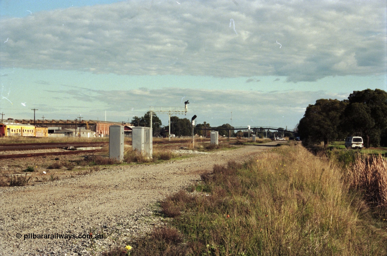 200-35
Midland, view looking towards Midland station with Workshops on the left, signals for the yard still in place and use. 24th June, 1997.
