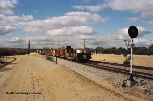 200-07
Moorine Rock, Westrail L class 271 departs the loop with the Barclay Mowlem ballast cleaning train, known as the Circus Train with a WGLA type waggon on the rear 22nd June 1997.
