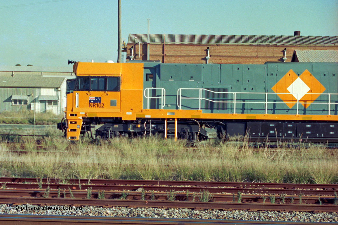 201-01
Midland, cab side of brand Goninan WA built GE Cv40-9i model NR class unit NR 102 serial 7250-07/97-302.
Keywords: NR-class;NR102;Goninan;GE;CV40-9i;7250-07/97-302;