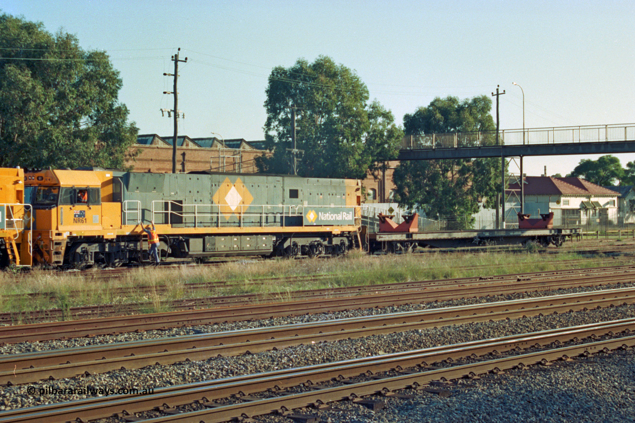 201-02
Midland, the first Perth built NR class NR 61 Goninan GE model Cv40-9i serial 7250-11/96-263 shunts at Midland with two brand new NR units and waggon RQRX type RQRX 60177.
Keywords: NR-class;NR61;Goninan;GE;CV40-9i;7250-11/96-263;