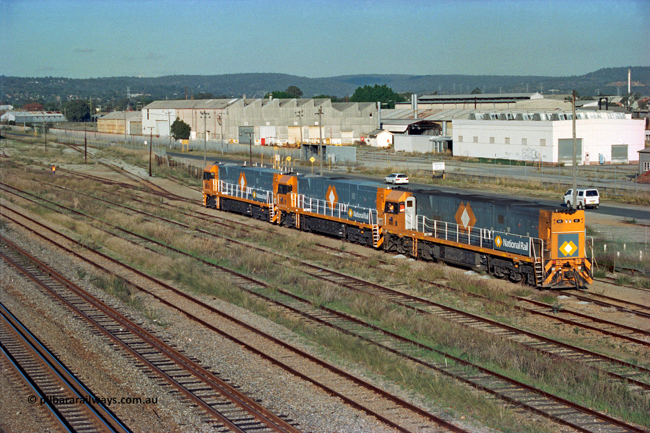 201-05
Midland, the first Perth built NR class NR 61 Goninan GE model Cv40-9i serial 7250-11/96-263 shunts at Midland with two brand new NR units.
Keywords: NR-class;NR61;Goninan;GE;CV40-9i;7250-11/96-263;