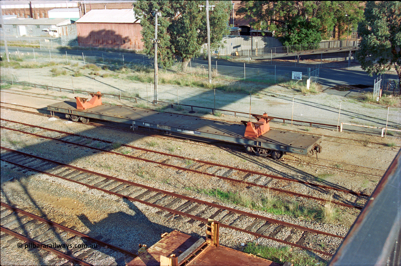 201-07
Midland, elevated view from the Workshops Footbridge, RQRX type waggon RQRX 60177 a 53 tonne capacity flat waggon, originally built by Comeng NSW in 1971 as part of a batch of fifty CBX type waggons, later converted from NQBX type NQBX 21782.
Keywords: RQRX-type;RQRX60177;Comeng-NSW;CBX-type;CBX21782;