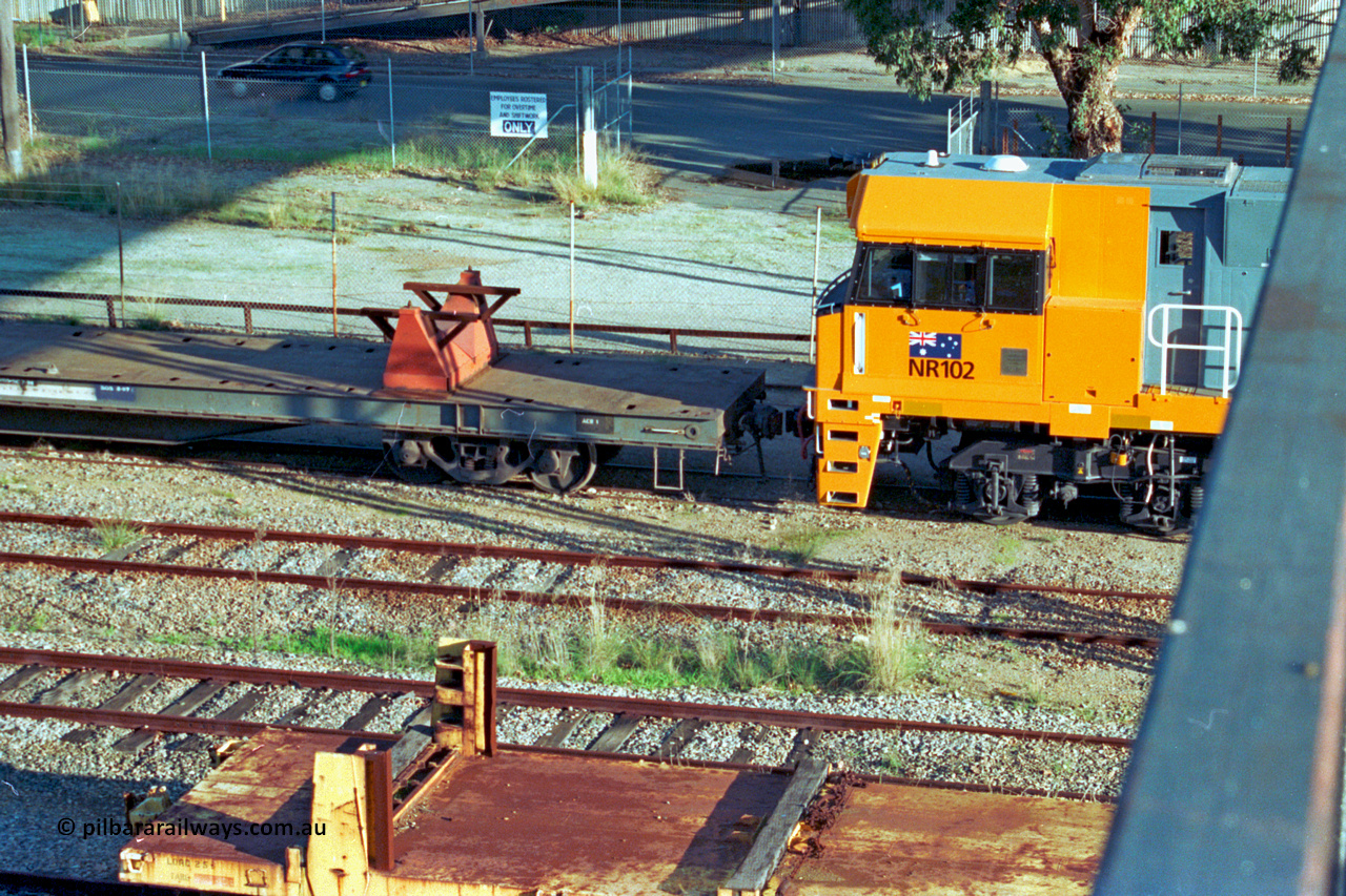 201-20
Midland, Goninan WA built GE Cv40-9i model NR class unit NR 102 serial 7250-07/97-302 shunts on RQRX type waggon RQRX 60177, with a WSR type rail distribution waggon in the foreground.
Keywords: NR-class;NR102;Goninan;GE;CV40-9i;7250-07/97-302;