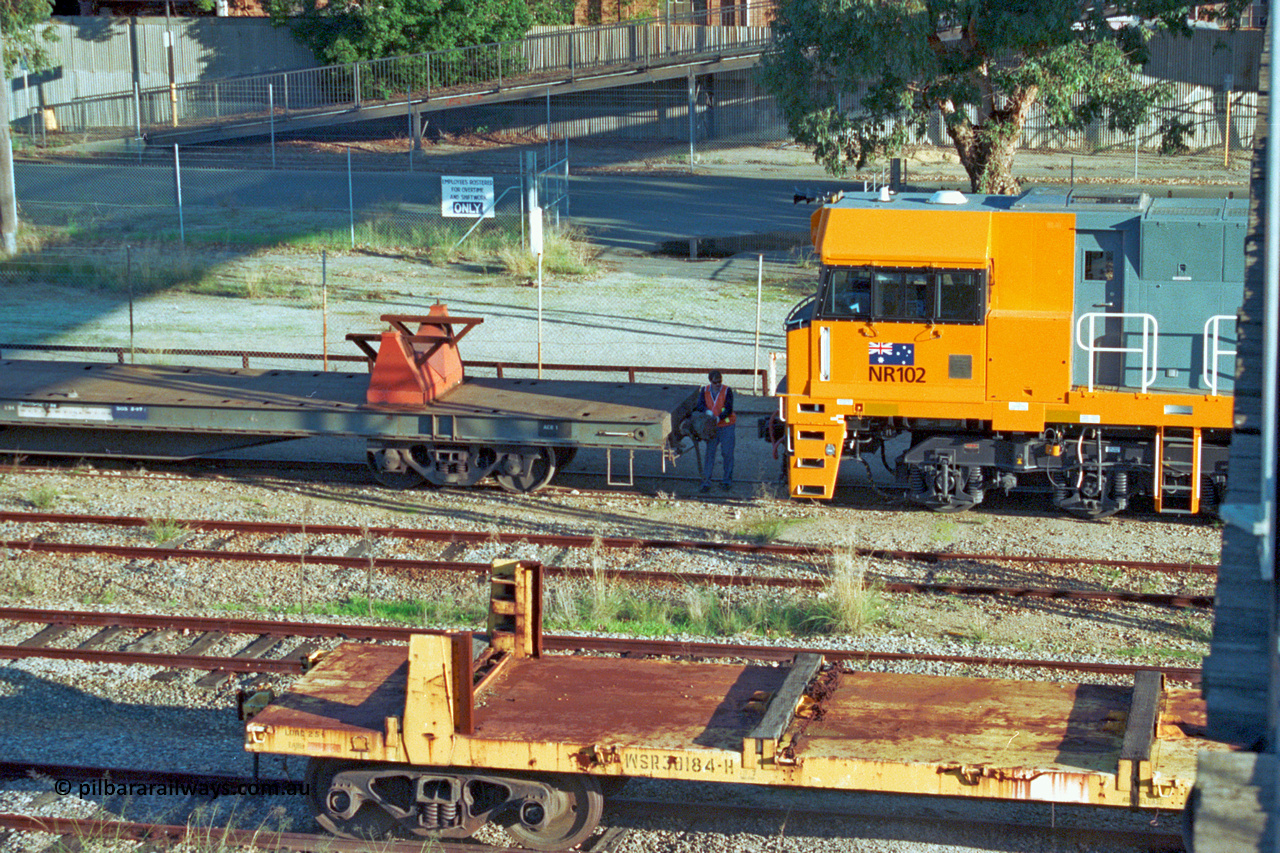 201-21
Midland, Goninan WA built GE Cv40-9i model NR class unit NR 102 serial 7250-07/97-302 shunts on RQRX type waggon RQRX 60177, with a WSR type rail distribution waggon in the foreground.
Keywords: NR-class;NR102;Goninan;GE;CV40-9i;7250-07/97-302;