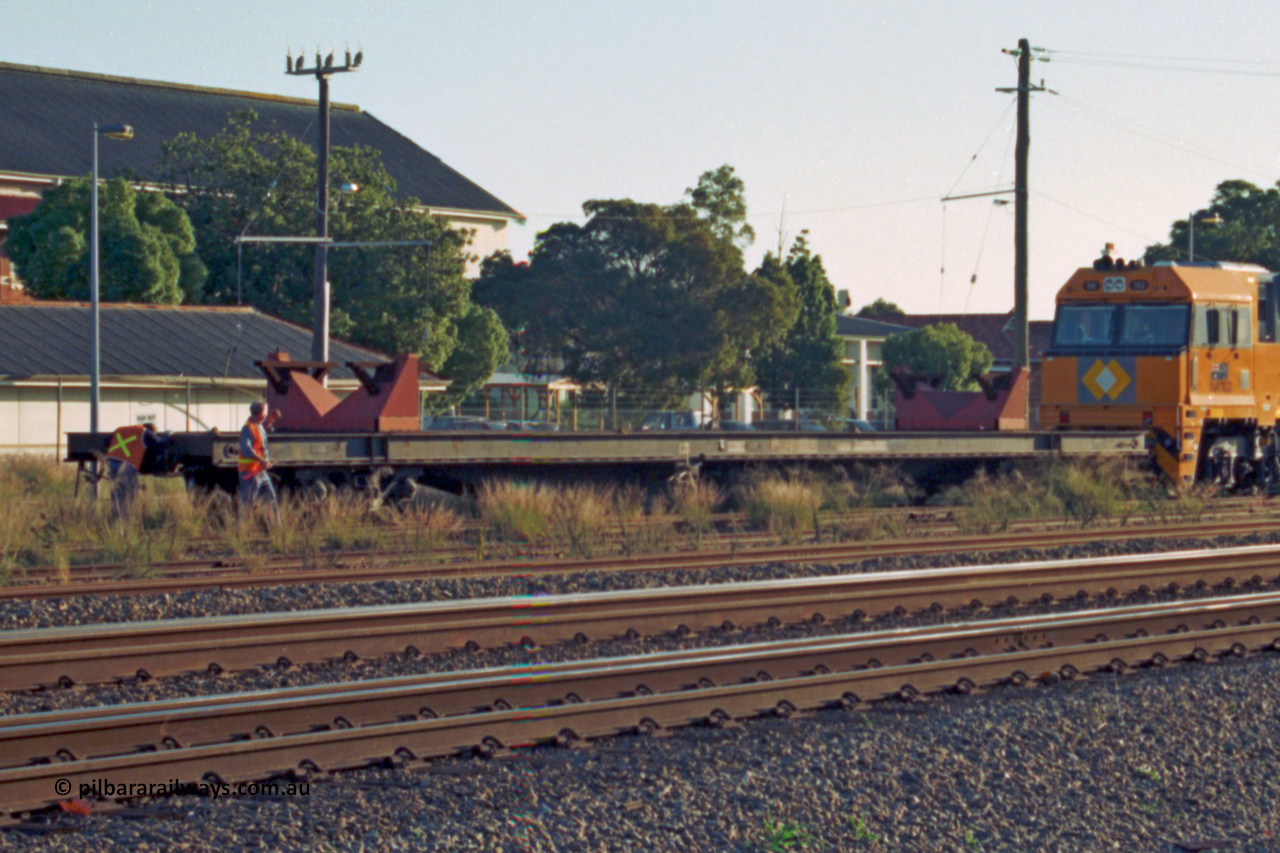 201-35
Midland, three quarter view of RQRX type waggon RQRX 60177 53 tonne capacity flat waggon coupled to new NR class NR 102, RQRX was converted from NQBX type NQBX 21782.
Keywords: RQRX-type;RQRX60177;Comeng-NSW;CBX-type;CBX21782;