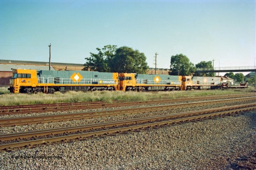 201-00
Midland, two brand Goninan WA built GE Cv40-9i model NR class units NR 102 serial 7250-07/97-302 and NR 101 serial 7250-07/97-303 lead the original Perth built NR 61 serial 7250-11/96-263 as the shunt around the yard.
Keywords: NR-class;NR102;Goninan;GE;CV40-9i;7250-07/97-302;