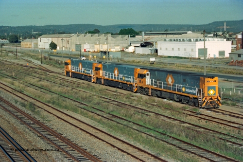 201-04
Midland, the first Perth built NR class NR 61 Goninan GE model Cv40-9i serial 7250-11/96-263 shunts at Midland with two brand new NR units.
Keywords: NR-class;NR61;Goninan;GE;CV40-9i;7250-11/96-263;