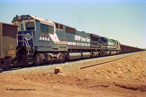 202-32
Yandi One, 307 km grade crossing, mid-train remote CM40-8ML Goninan GE unit 5663 'Newcastle' serial 8412-08/94-154 was originally built 'cabless' but now fitted with one, also note the difference in the ALCo builds by the fuel tanks, 5666 was originally an M636C built by Comeng while 5663 was originally built by AE Goodwin.
Keywords: 5663;Goninan;GE;CM40-8ML;8412-08/94-154;rebuild;AE-Goodwin;ALCo;M636C;5476;G6047-8;