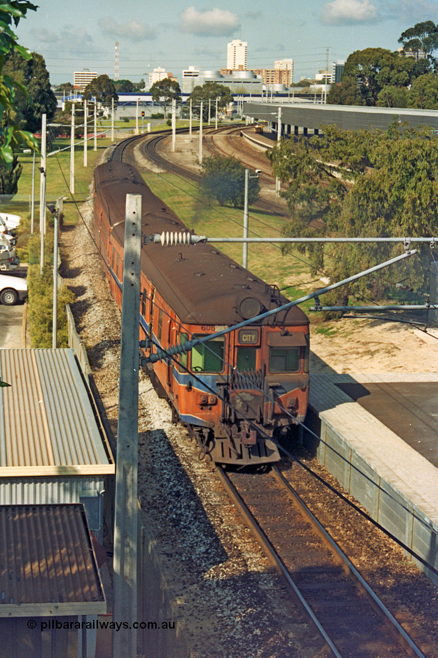 208-1-21
East Perth, narrow gauge Trans Perth three car set with Cravens of Sheffield, England built ADG class ADG 605 on the rear of a Perth bound service.
