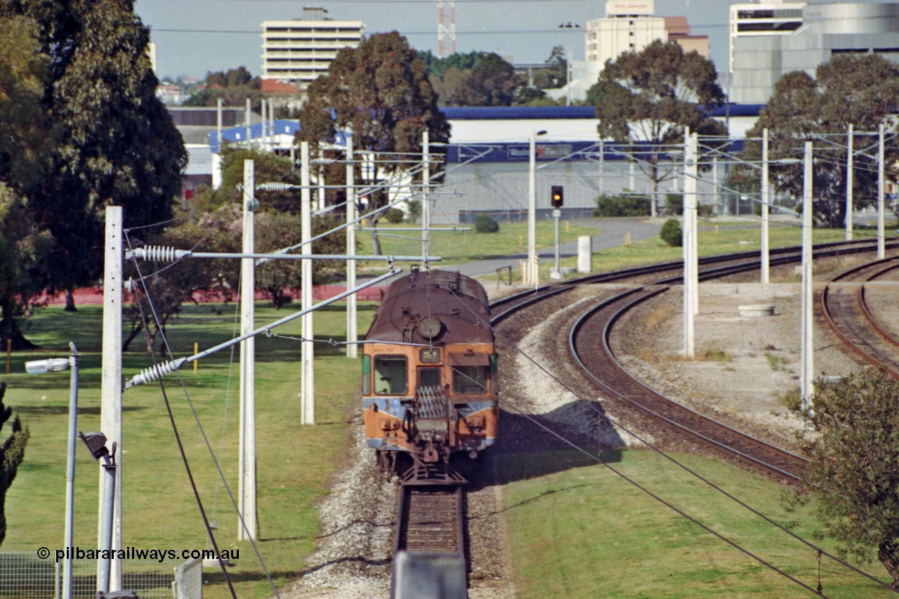 208-2-09
East Perth, narrow gauge Trans Perth two car set with Cravens of Sheffield, England built ADG class on the rear of a Perth bound service.
