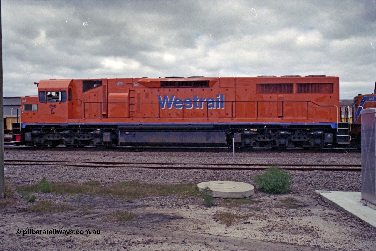 208-2-16
Midland, Westrail L class L 262 Clyde Engineering EMD model GT26C serial 68-552, leading another L class unit on the midday east bound freighter, side view, 27th September 1991.
Keywords: L-class;L262;Clyde-Engineering-Granville-NSW;EMD;GT26C;68-552;