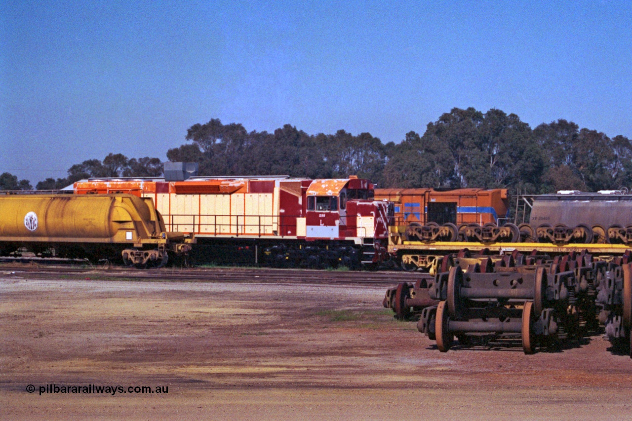 208-2-28
Midland Workshops, Westrail L class L 255 a Clyde Engineering EMD model GT26C, serial 67-545 under overhaul surrounded by various rollingstock including the WSL 30650 bogie transport waggon which was built for this task in 1977 at Midland Workshops.
Keywords: L-class;L255;Clyde-Engineering-Granville-NSW;EMD;GT26C;67-545;WSL-type;WSL30650;