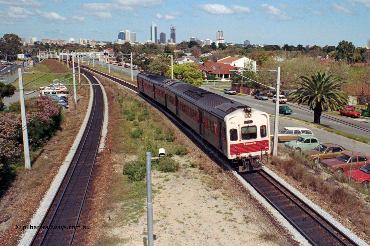 209-08
Mt Lawley station, narrow gauge Perth to Midland service arrives with an Goninan NSW built ADC class railcar ADC 851 leading an ADL class with the Perth skyline in the background.
Keywords: ADC-type;ADC851;Goninan-NSW;