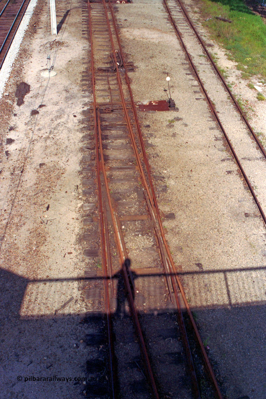 209-12
Ashfield, looking towards Perth from the station overbridge, the dual gauge tracks and yard running between the mainline and Railway Parade on the right. The narrow gauge points are at the foot of the picture.
