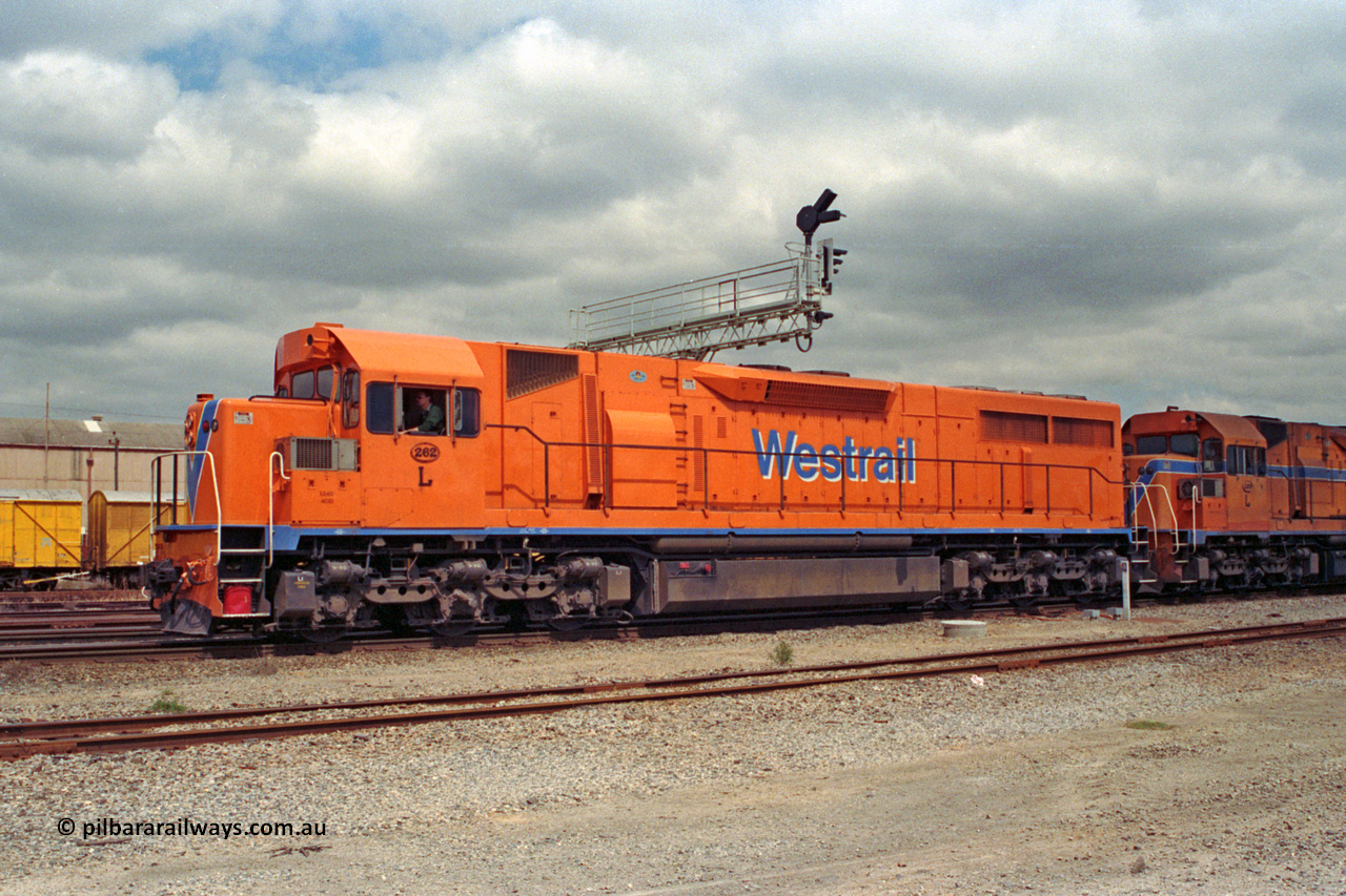 209-20
Midland, the midday east bound freighter arrives behind Westrail's Clyde Engineering built EMD GT26C model L class units L 262 serial 68-552 and L 269.
Keywords: L-class;L262;Clyde-Engineering-Granville-NSW;EMD;GT26C;68-552;