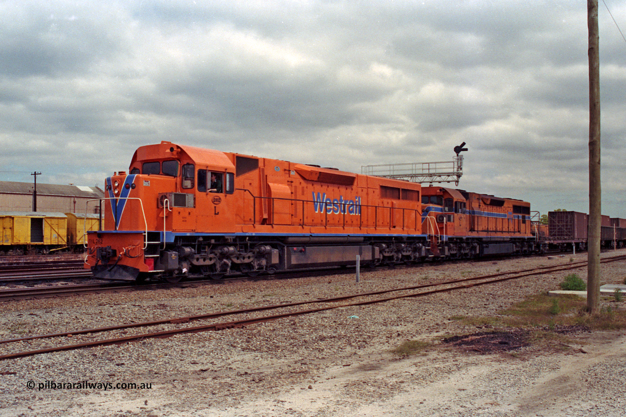 209-22
Midland, the midday east bound freighter waits for line clear behind Westrail's Clyde Engineering built EMD GT26C model L class units L 262 serial 68-552 and L 269.
Keywords: L-class;L262;Clyde-Engineering-Granville-NSW;EMD;GT26C;68-552;