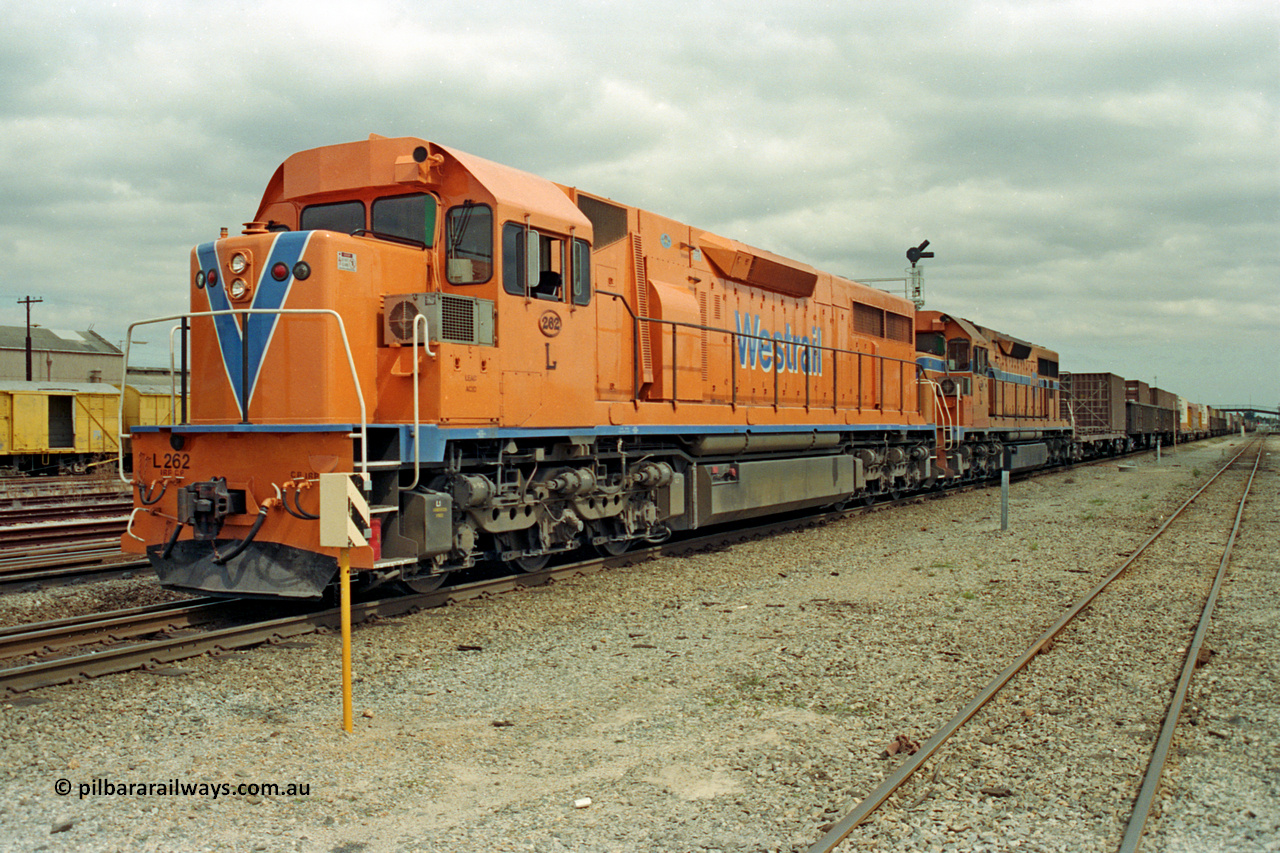 209-24
Midland, the midday east bound freighter waits for line clear behind Westrail's Clyde Engineering built EMD GT26C model L class units L 262 serial 68-552 and L 269.
Keywords: L-class;L262;Clyde-Engineering-Granville-NSW;EMD;GT26C;68-552;