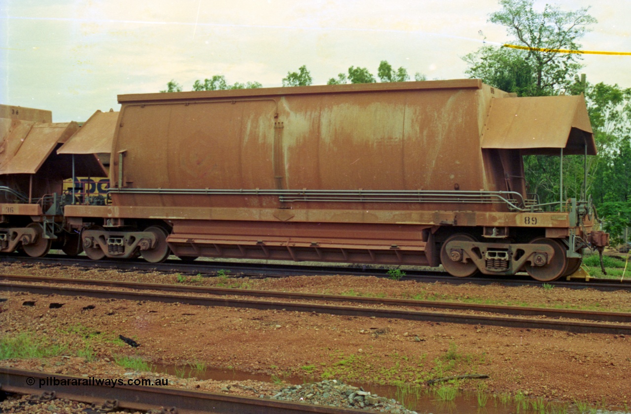 210-12
Weipa, Lorim Point railway workshops, Comeng Qld 1976 build HMAS type bottom discharge ore car 3089, this was the second last car of that order.
Keywords: HMAS-type;Comeng-Qld;Comalco;