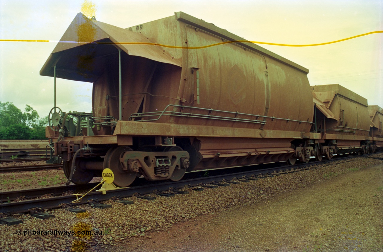 210-13
Weipa, Lorim Point railway workshops, Comalco ore waggon 3089, 1 of 29 HMAS type built by Comeng Qld in 1974-76, behind it is car 3036 from the original order of 61 HMAS waggons also build by Comeng Qld in 1971-72, and now fitted with hungry boards.
Keywords: HMAS-type;Comeng-Qld;Comalco;