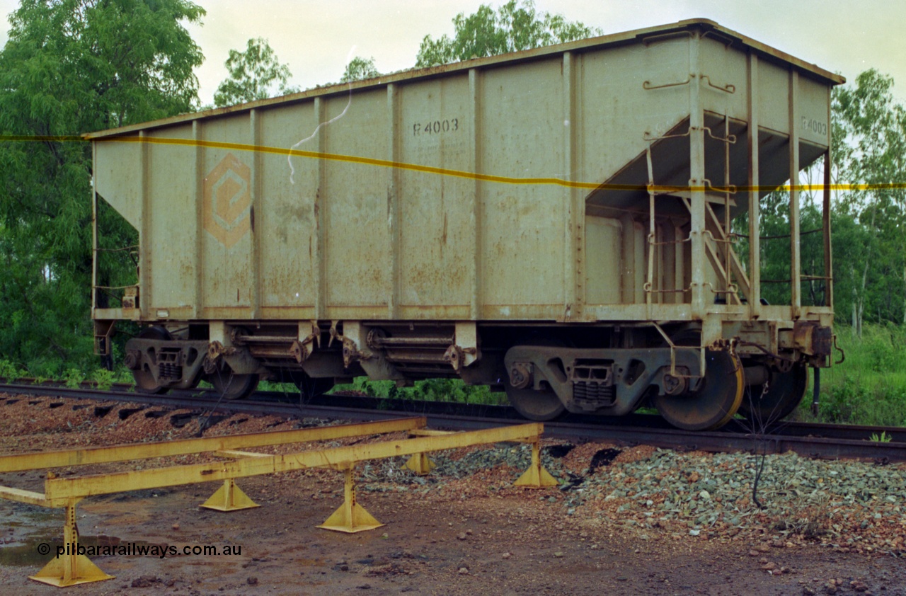 210-15
Weipa, Lorim Point track maintenance compound, the only ballast waggon in the rollingstock fleet is R 4003. Comeng Qld supplied a ballast waggon in 1971 (ordered in Feb 1971, delivered in Sept 1971), you can see the Comeng plate on the left hand end of the waggon frame, but this waggon does looks more like an American import.
Keywords: R4003;Comeng-Qld;Comalco;