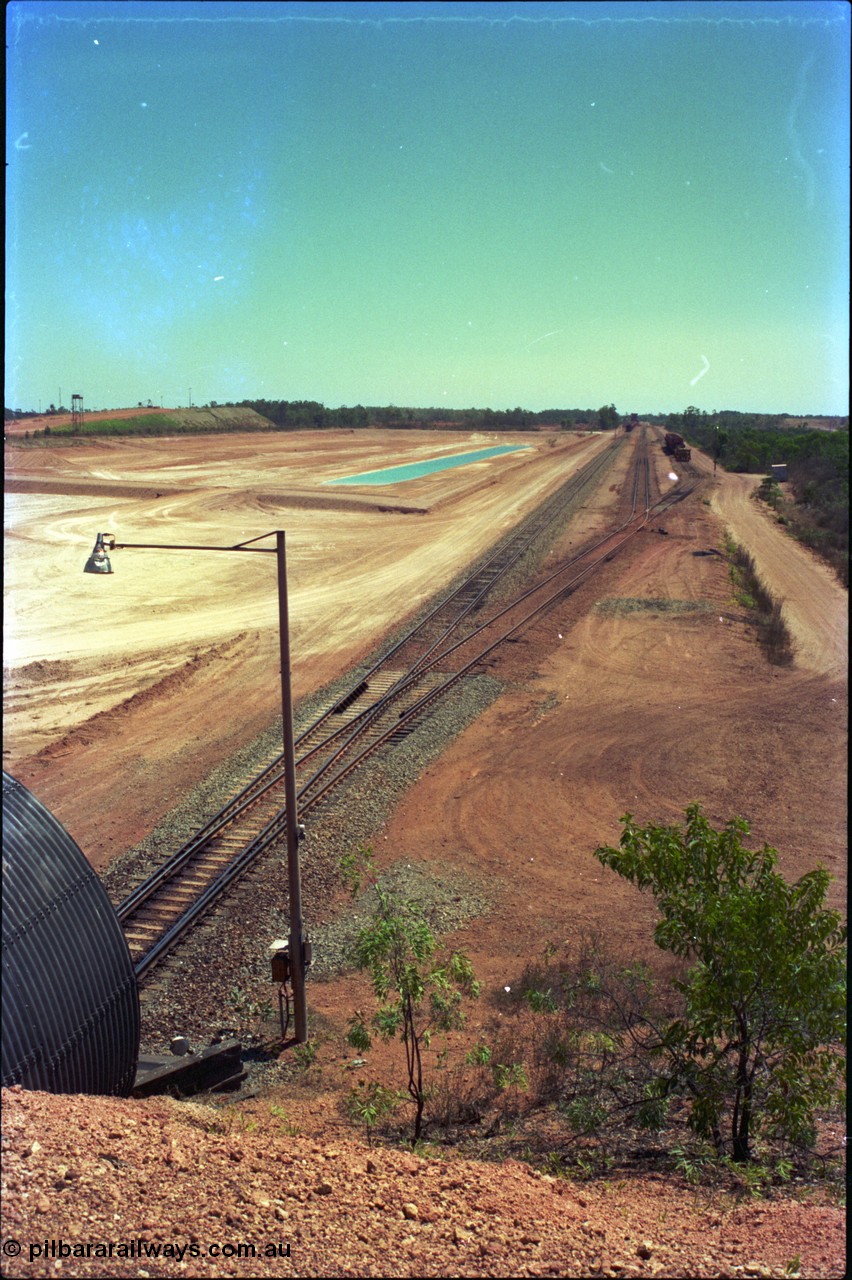 212-01
Weipa, view from the road overbridge looking towards the dump station and small yard that is Lorim Point, the dump station is in the far distance.
