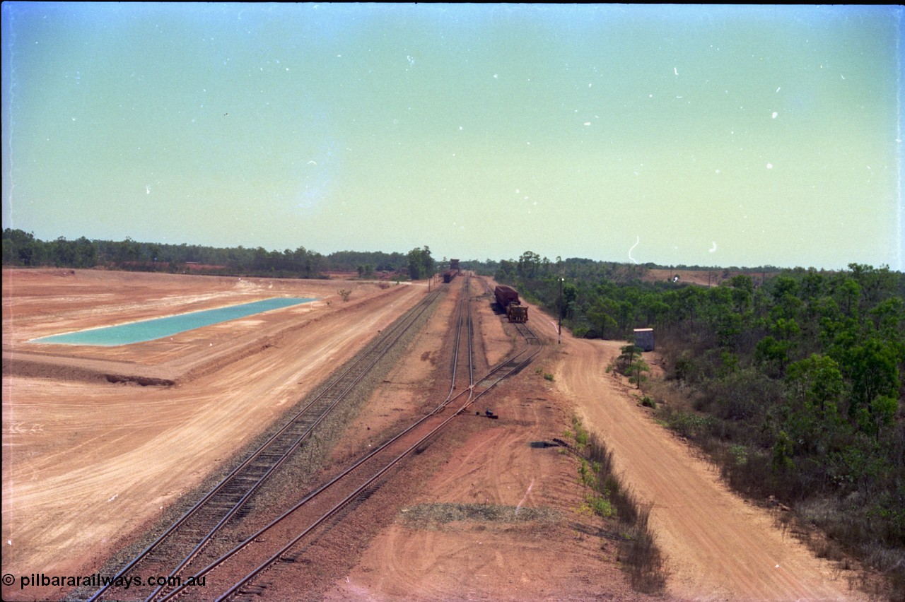 212-02
Weipa, view from the road overbridge looking towards the dump station and small yard that is Lorim Point, the dump station is in the far distance.
