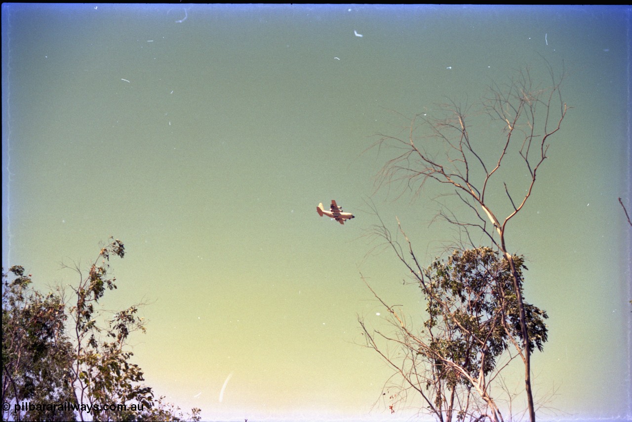 212-05
Weipa, RAAF Hercules plane preparing for landing at Scherger Base.
