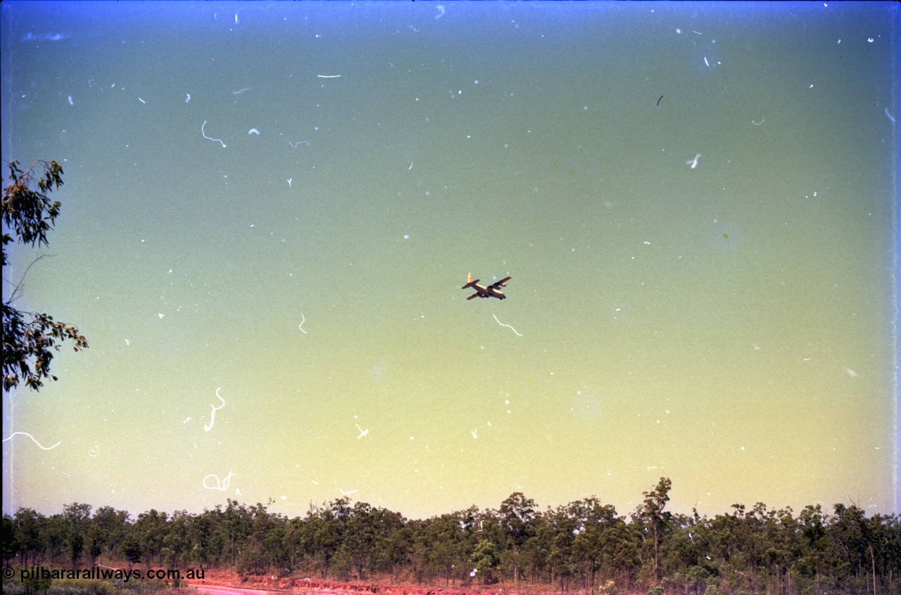 212-06
Weipa, RAAF Hercules plane preparing for landing at Scherger Base.
