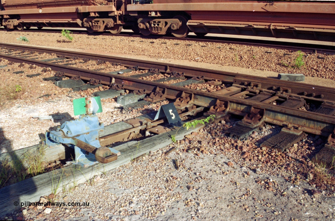 213-11
Weipa, Lorim Point workshops yard, ground throw point or switch operating unit with the number 5 identification.
