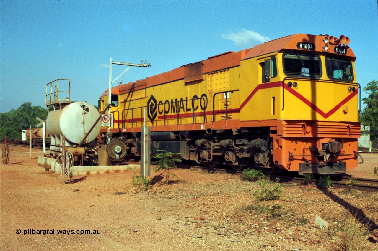 213-19
Weipa, Lorim Point fuel point, Comalco R 1004 loco Clyde Engineering built EMD model JT42C built 1990 serial 90-1277, weight 132 tonne, engine 12-710G3A, generator AR11-WBA-CA5, traction motors D87ETR, rated power 2460 kW/3300 hp. The body is similar to a V/Line N class while the components are the same as the Australian National AN class. Originally built for Goldsworthy Mining as GML 10 for use at their Western Australian iron ore railway and locally known as Cinderella. Purchased by Comalco in 1994 following the takeover of Goldsworthy by BHP.
Keywords: R1004;Clyde-Engineering-Kelso-NSW;EMD;JT26C;90-1277;Comalco;GML10;Cinderella;GML-class;